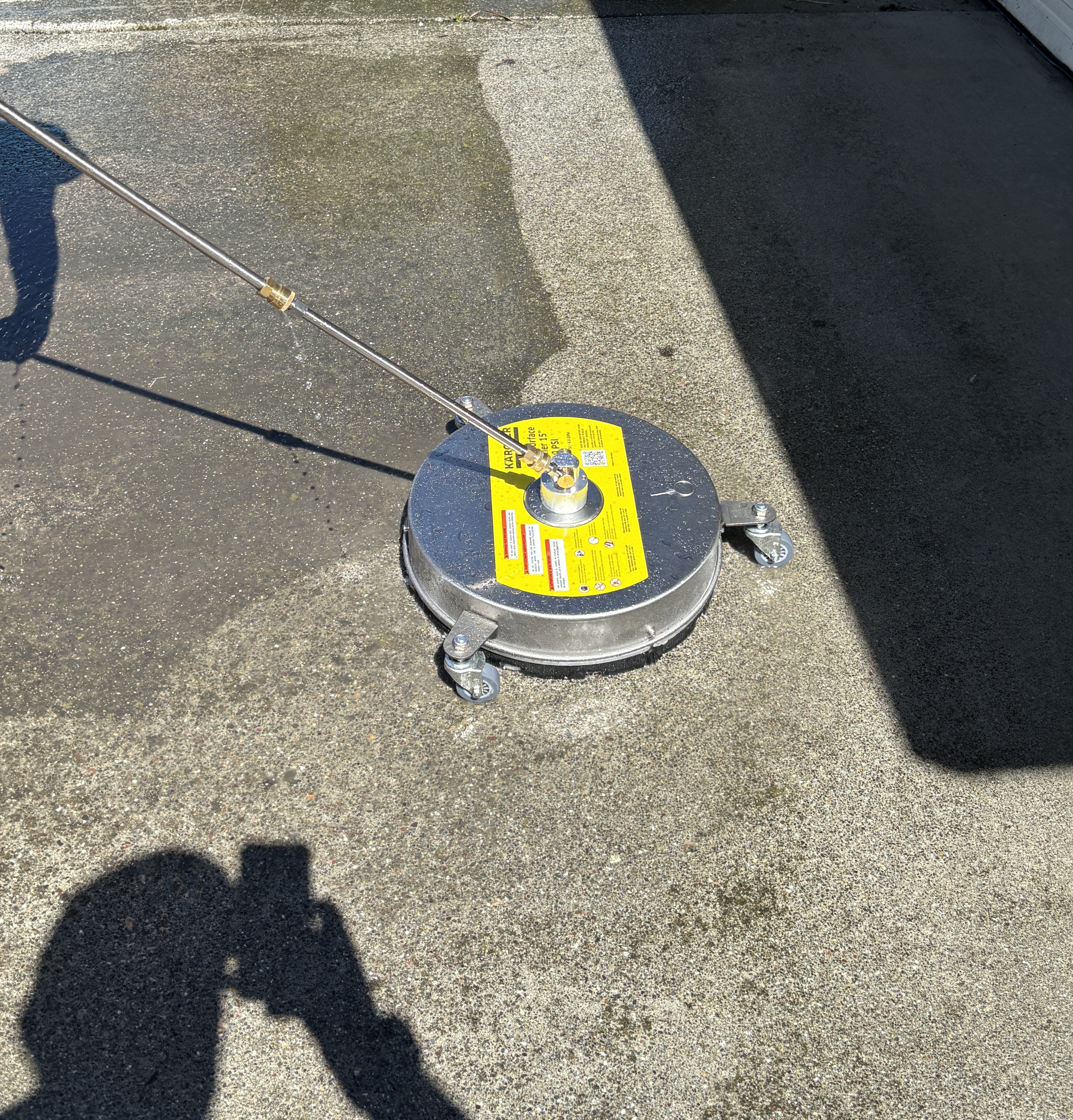 Professional surface cleaner on driveway